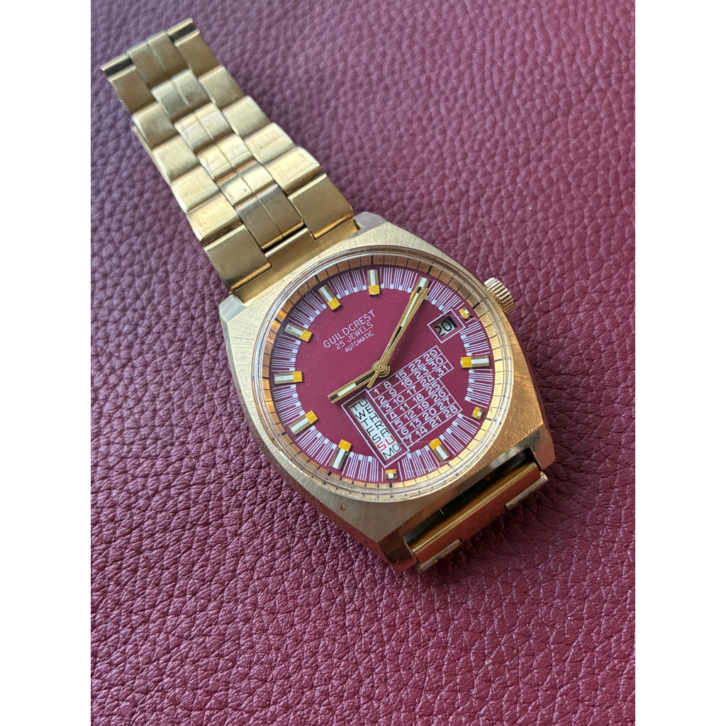 Vintage Guildcrest 25 Jewels Automatic Red Dial Calendar Gold Tone Watch