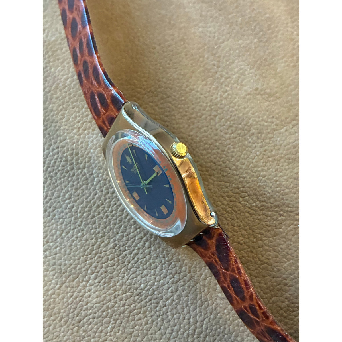 Vintage Swatch Swiss Quartz Watch Gold Tone Black Orange Dial Skeleton Back