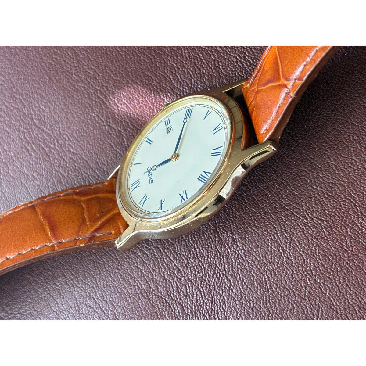 Vintage Seiko 7N39 Quartz Roman Numeral Blue Hands Gold Tone Mens Watch
