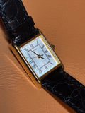 Vintage Seiko Tank 1N01-5G40 Gold Tone Roman Numeral Quartz Watch Cabochon Crown