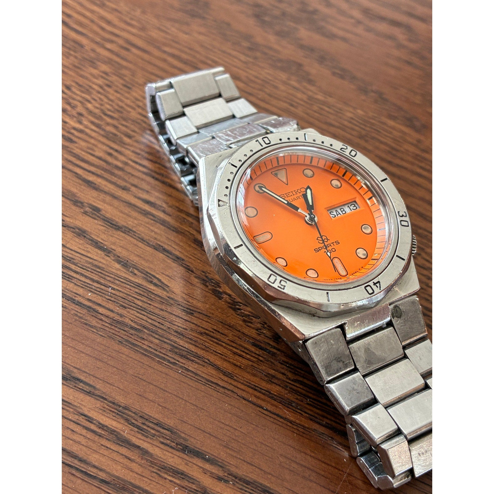 Vintage Seiko SQ Sports 100 Orange Dial Day Date- Bold Retro Style