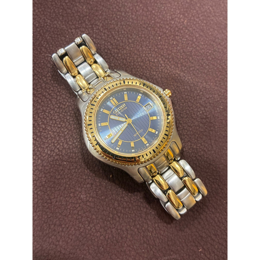 Citizen Eco-Drive E111-S034701 WR100 Blue Dial Two Tone Sapphire Men’s Watch