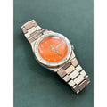 Vintage Seiko SQ Sports 100 Orange Dial Day Date- Bold Retro Style