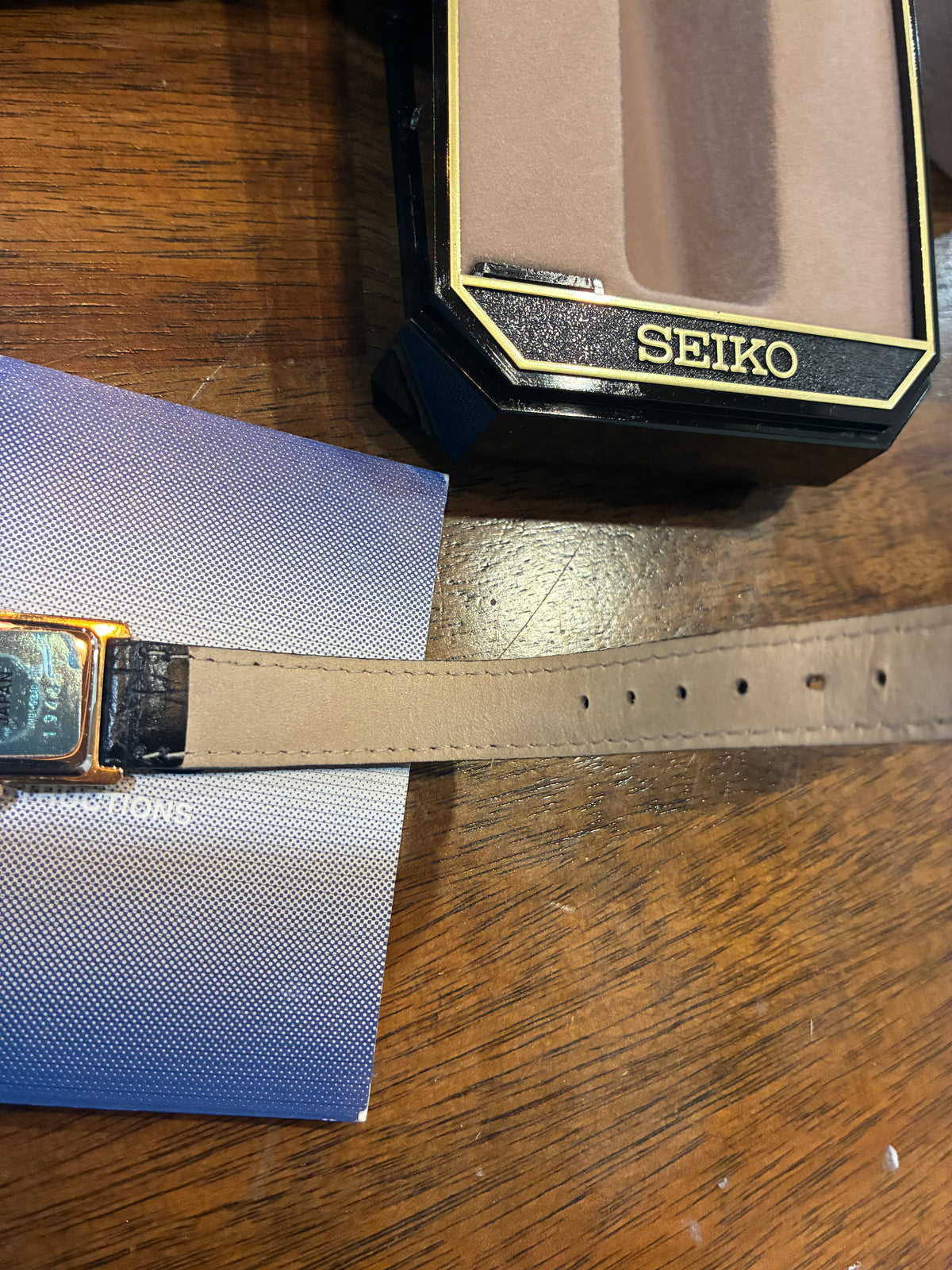 Vintage Seiko Tank 1N01-5G40 Gold Tone Roman Numeral Quartz Watch Cabochon Crown