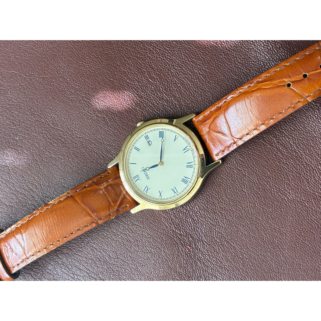 Vintage Seiko 7N39 Quartz Roman Numeral Blue Hands Gold Tone Mens Watch