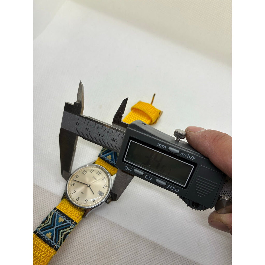 Timex Water resistant mechanical watch on hipster strap.