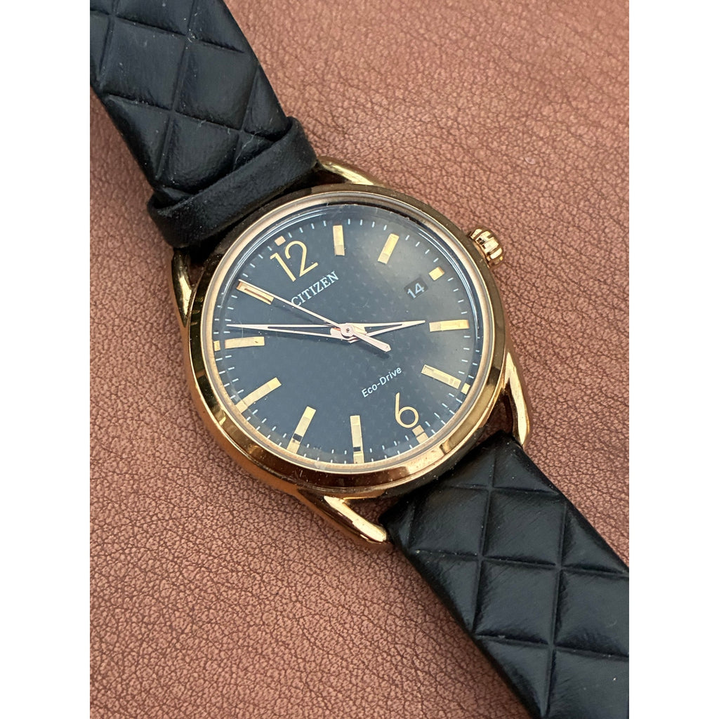 Citizen Eco-Drive J810-S108667 Gold Tone Black Dial Date Leather Watch