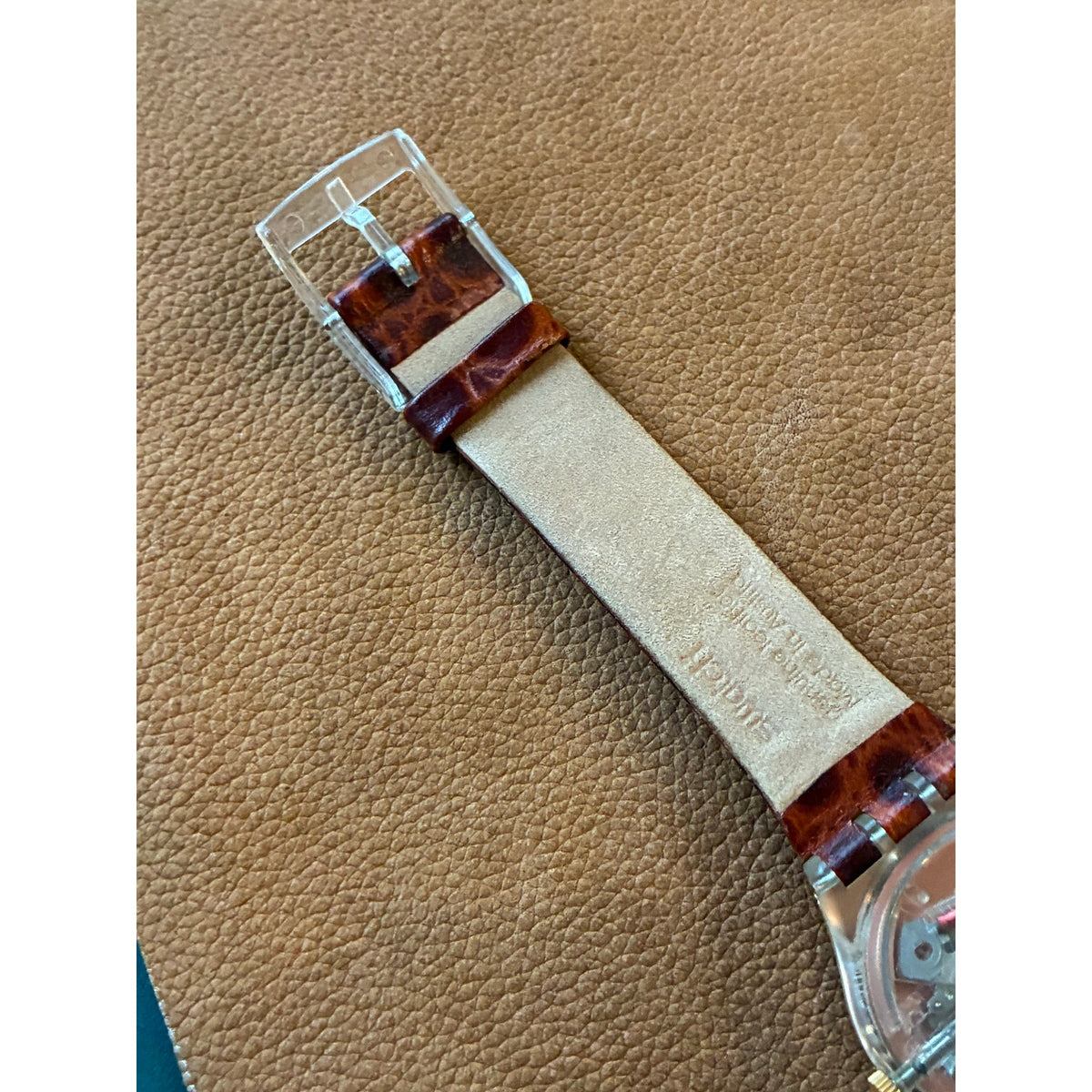 Vintage Swatch Swiss Quartz Watch Gold Tone Black Orange Dial Skeleton Back