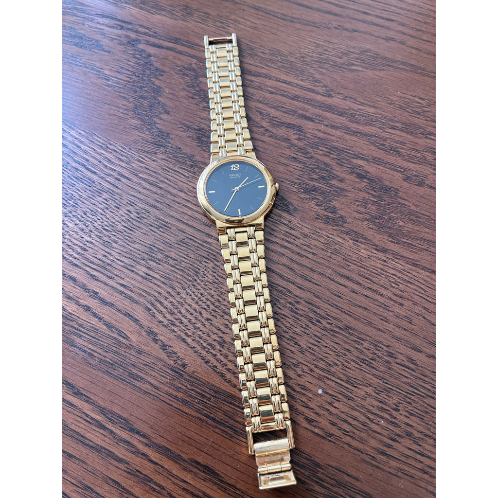 Seiko Quartz Women’s Watch Gold Tone Black Dial Dress Watch New Battery