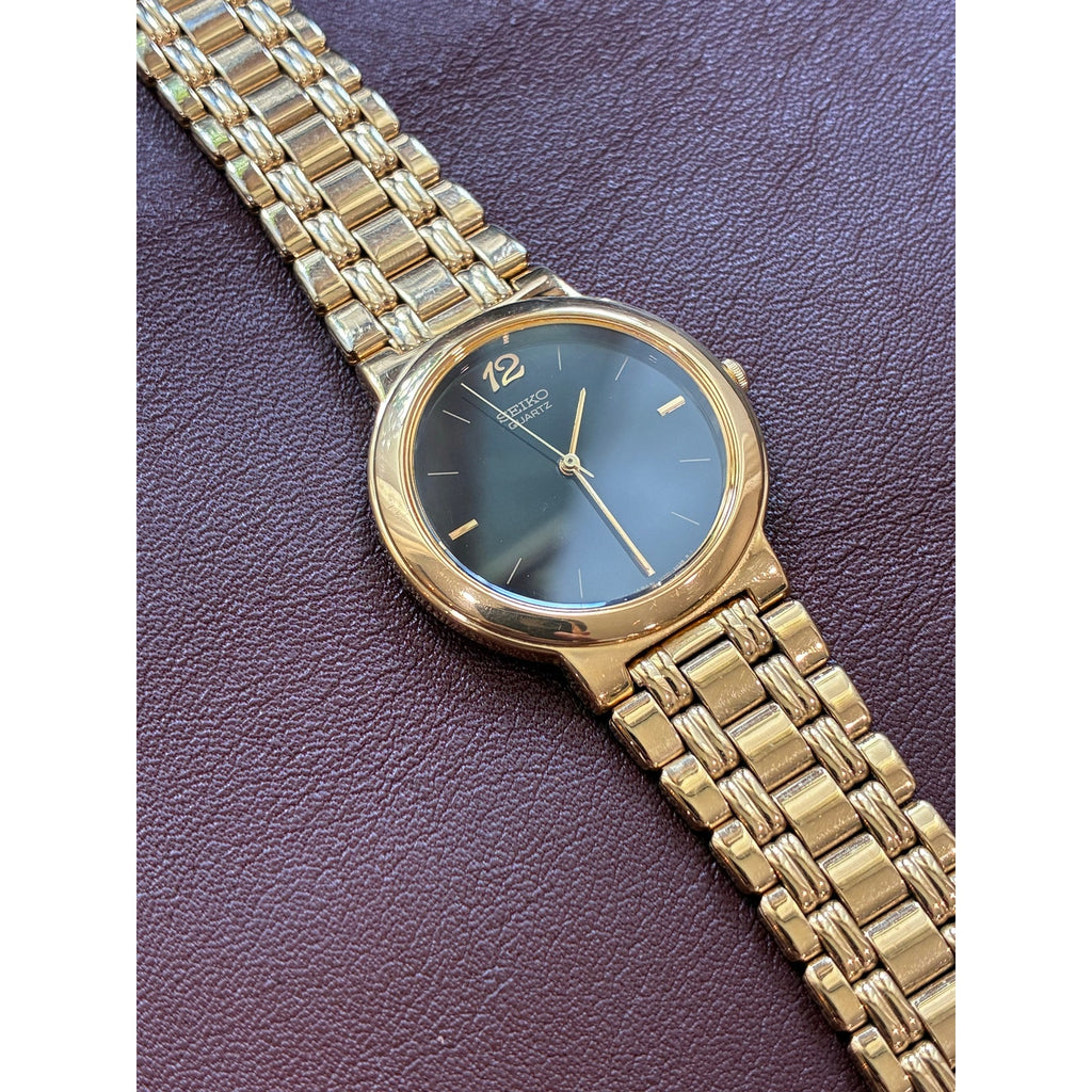 Seiko Quartz Women’s Watch Gold Tone Black Dial Dress Watch New Battery