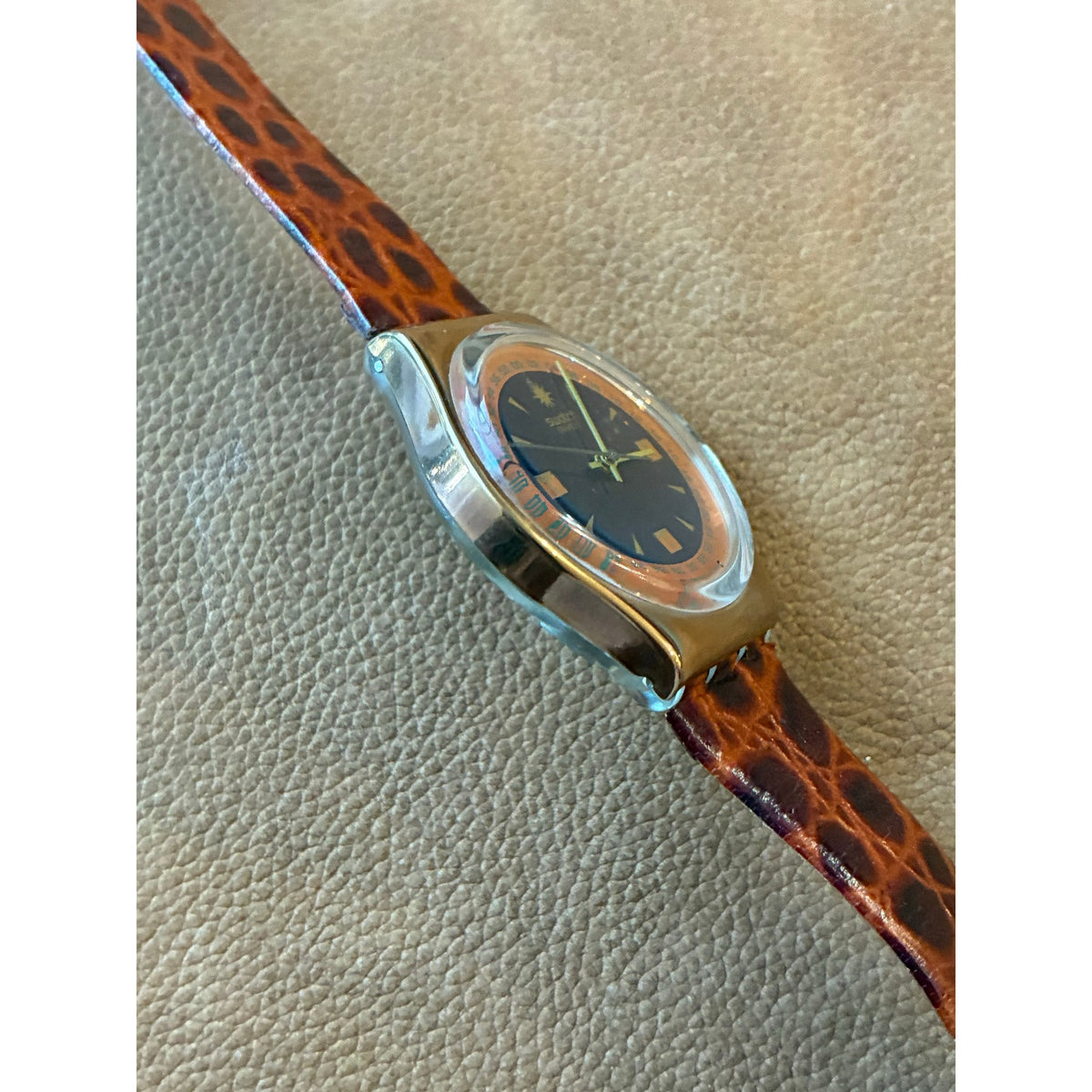 Vintage Swatch Swiss Quartz Watch Gold Tone Black Orange Dial Skeleton Back
