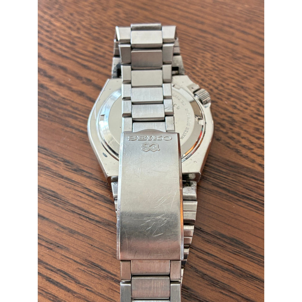 Vintage Seiko SQ Sports 100 Orange Dial Day Date- Bold Retro Style