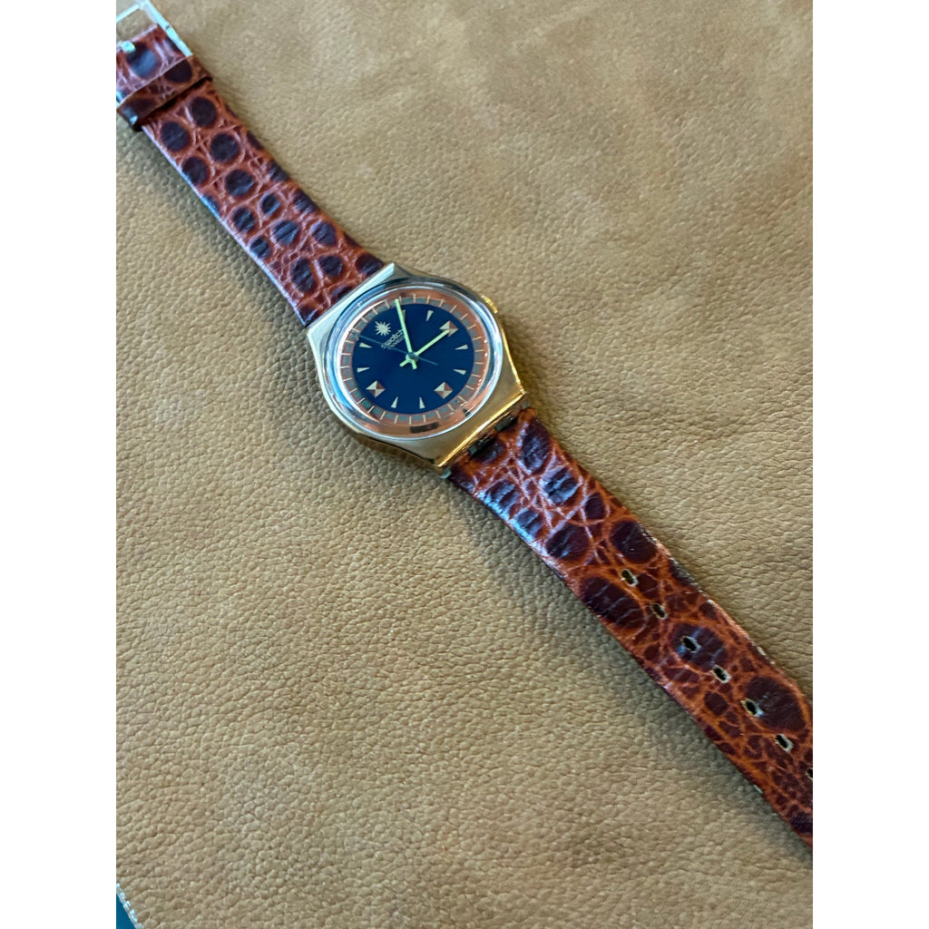 Vintage Swatch Swiss Quartz Watch Gold Tone Black Orange Dial Skeleton Back